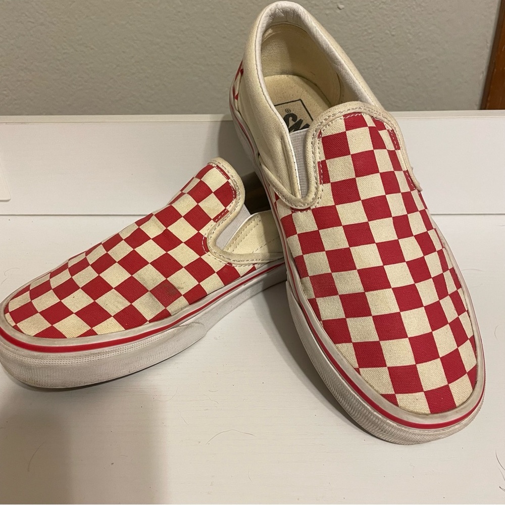 Women’s red and white checkered slip on Vans. Size 8